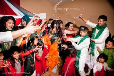 Asian - Bengali - fun wedding with with silly strings